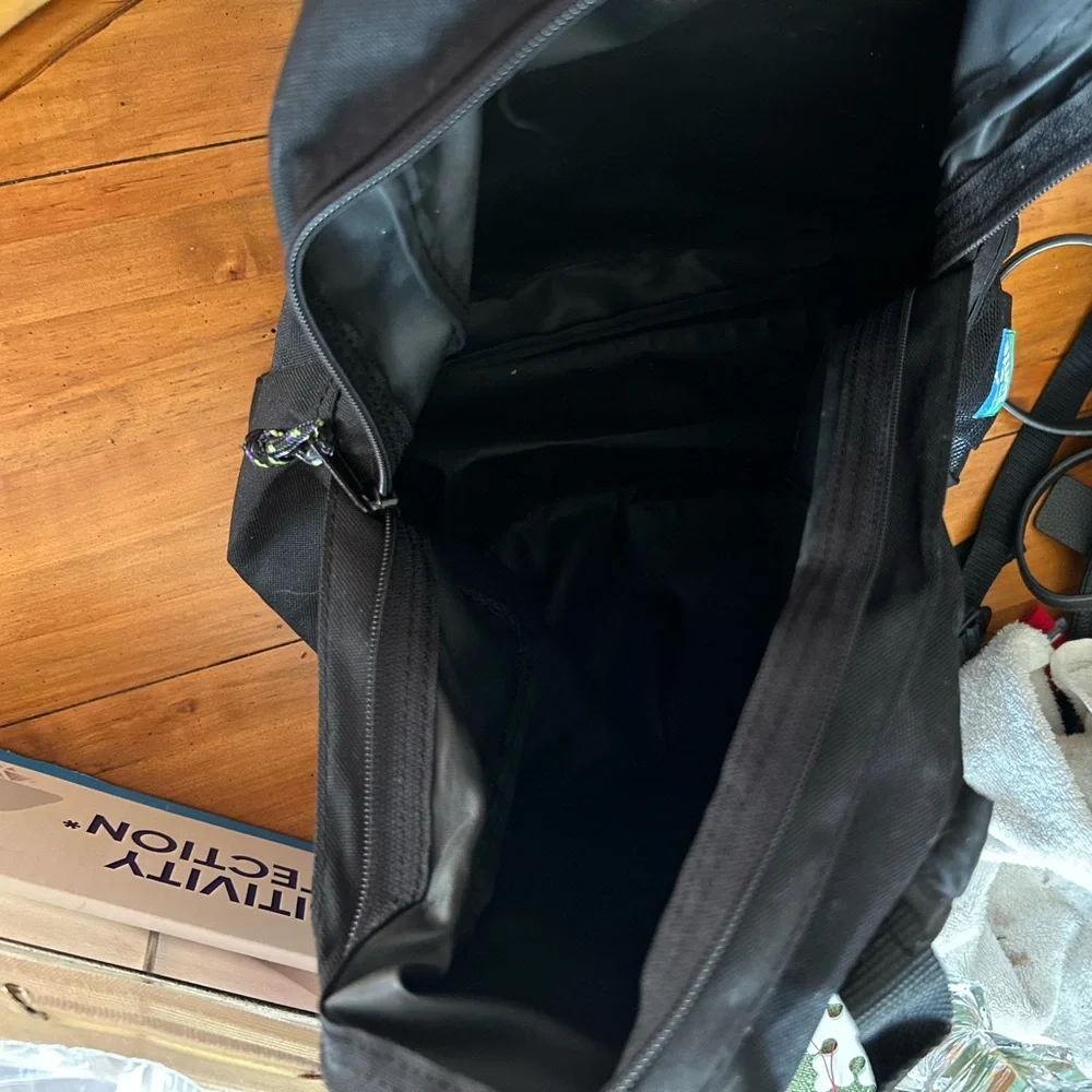 NWOT Fun & Cute black backpack with great front multiple zipper pockets